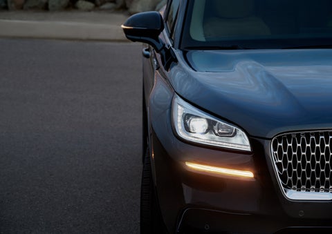 The turn signal on the front fascia is a bold sunset orange stroke of brilliance against a Flight Blue exterior | Empire Lincoln in Abingdon VA