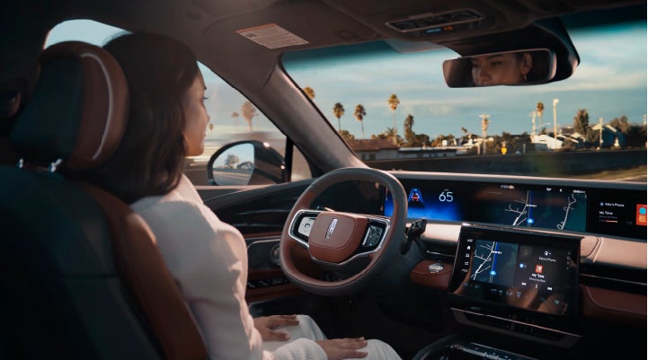 A person is shown driving hands-free on the highway with available Lincoln BlueCruise technology. | Empire Lincoln in Abingdon VA