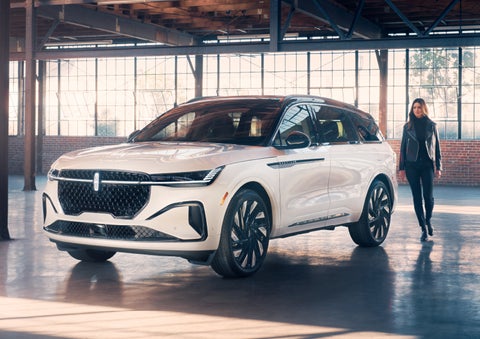 A person approaches a 2024 Lincoln Nautilus® SUV. | Empire Lincoln in Abingdon VA