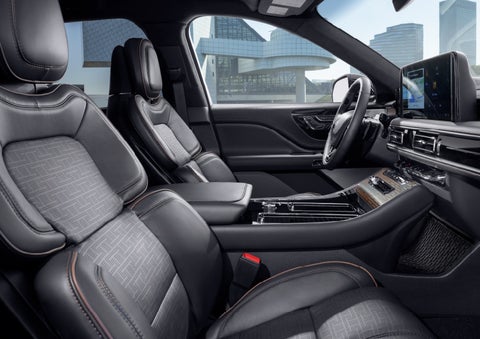 The interior of the 2025 Lincoln Aviator® SUV is shown with sleek black accents. | Empire Lincoln in Abingdon VA