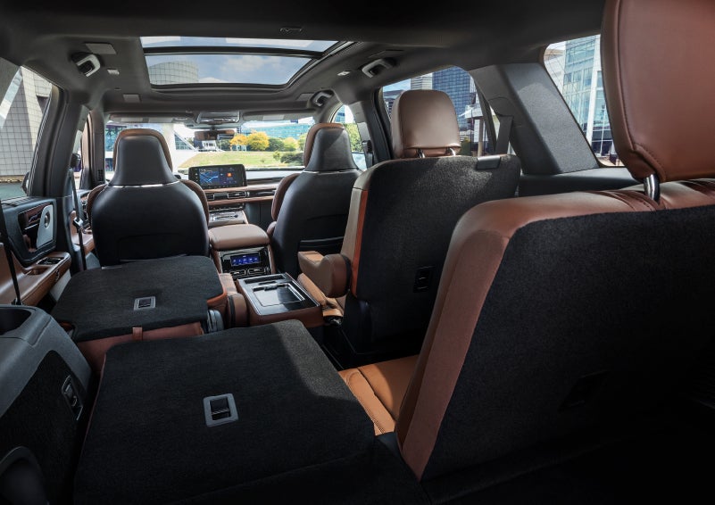 The interior of the 2025 Lincoln Aviator® SUV is shown with two seats folded down for added space. | Empire Lincoln in Abingdon VA