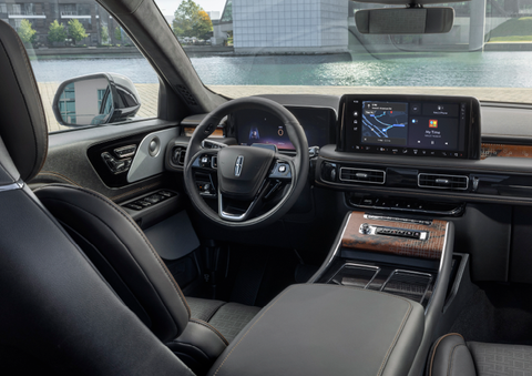 The interior of the 2025 Lincoln Aviator® SUV is shown parked with a view of a harbor through the windshield. | Empire Lincoln in Abingdon VA