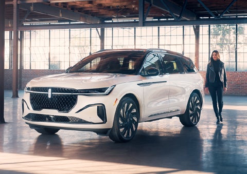 A person approaches a 2025 Lincoln Nautilus® SUV. | Empire Lincoln in Abingdon VA