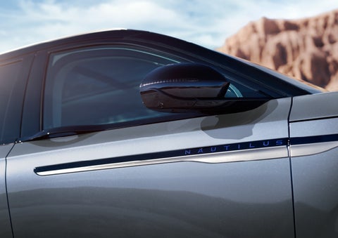 Blue lettering on the side of the vehicle that reads nautilus indicates the available hybrid powertrain. | Empire Lincoln in Abingdon VA